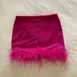 Pink skirt with feather trim